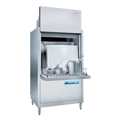 Commercial dishwasher interior being cleaned — comparing chemical requirements with domestic models