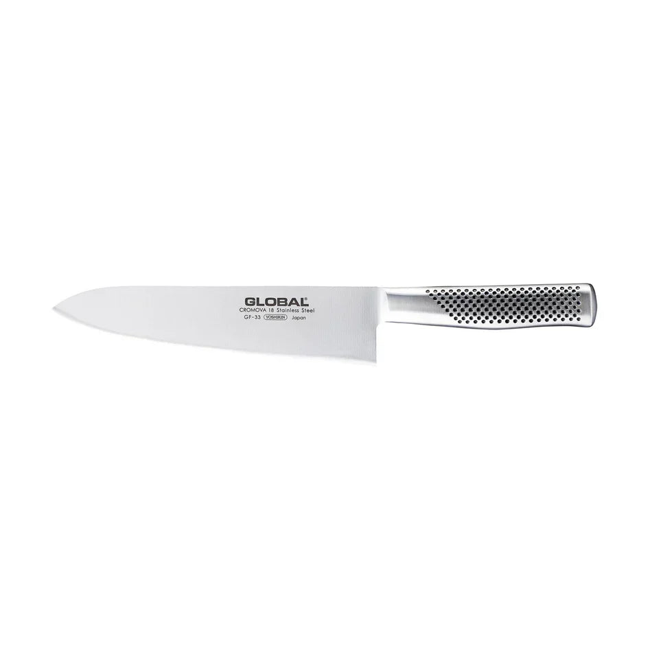 Chef's knife and butcher's knife placed side by side to compare blade shape and purpose