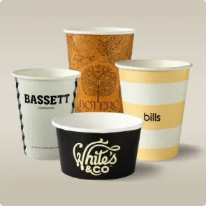 Custom-branded BioCup disposable coffee cups with company logo printed on them