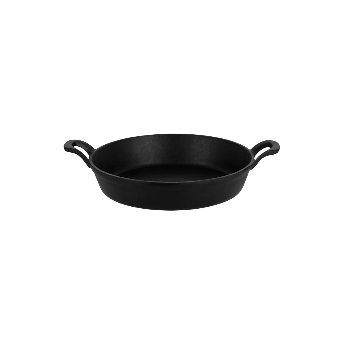 Seasoned cast iron skillet being dried and oiled after washing to prevent rust