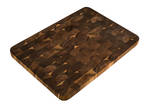 End grain and long grain wooden cutting boards side by side showing the different wood patterns
