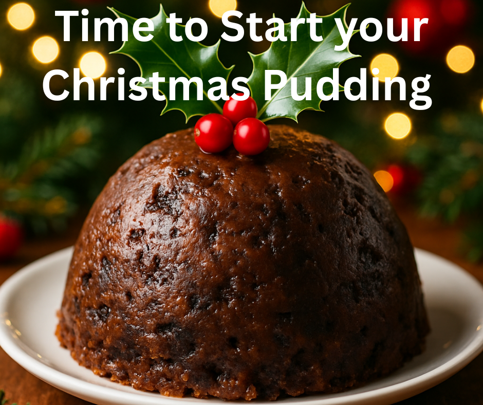 Traditional Christmas pudding ready to serve with festive decorations
