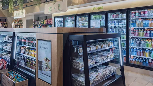 Commercial refrigeration buyer's guide — glass door fridge in a café showing key features to evaluate
