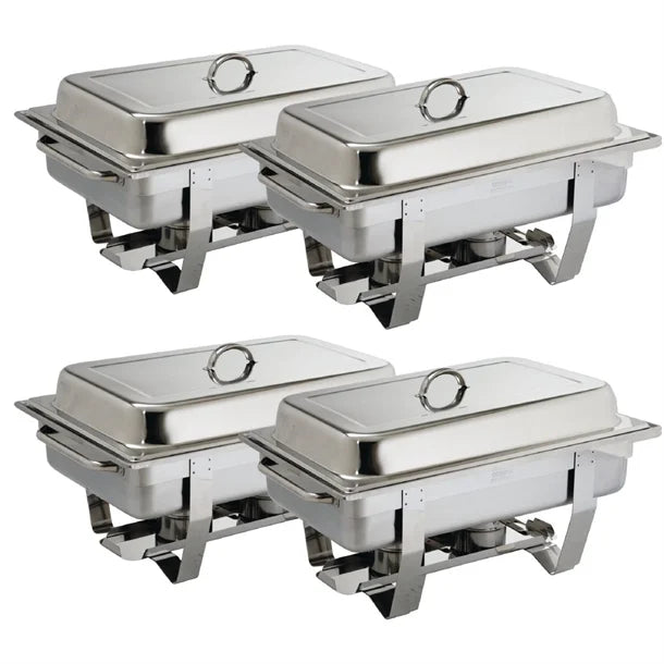 Round and rectangular chafing dishes set up at a catering buffet with fuel burners