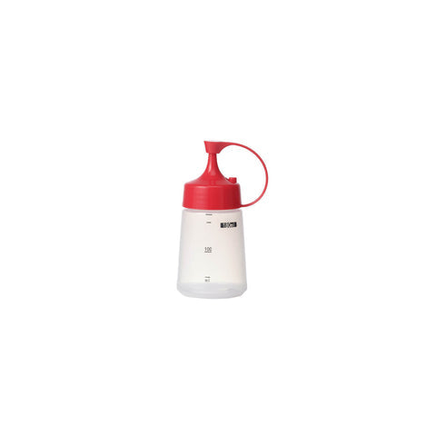 Chef Inox soft squeeze bottle with red cap, 180ml, used for sauces or dressings, made of durable plastic, ideal for kitchen use.