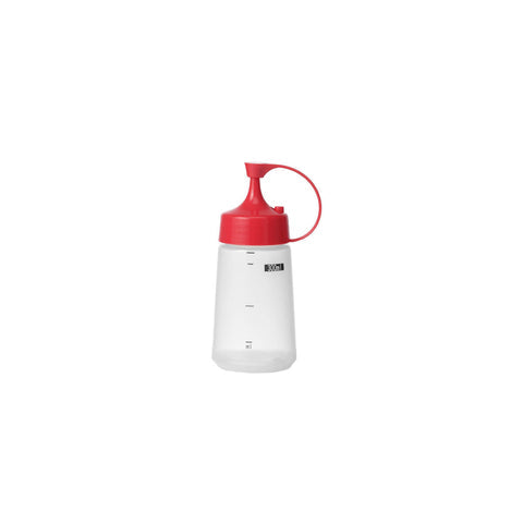 Chef Inox soft squeeze bottle with red cap, 300ml, used for sauces or dressings in kitchen, made of durable plastic.