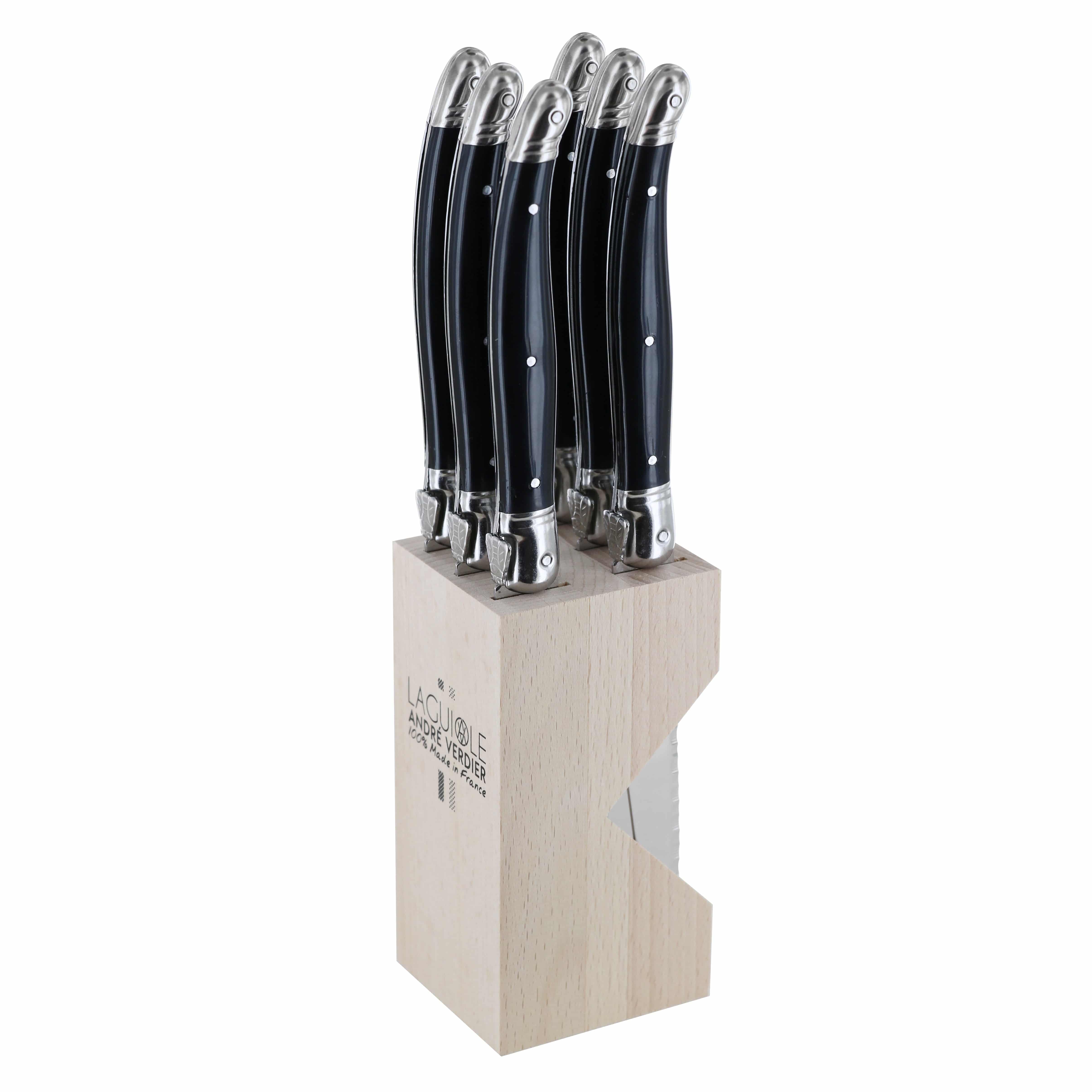 Set of six Andre Verdier Laguiole Debutant Omnicoleur black steak knives in a wooden block, featuring sleek handles and sharp blades.