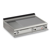 Baron Q90FTT/G1220
Three burner, bench model gas fry top with 2/3 smooth and 1/3 ribbed mild steel plate. - Hospitality Connect