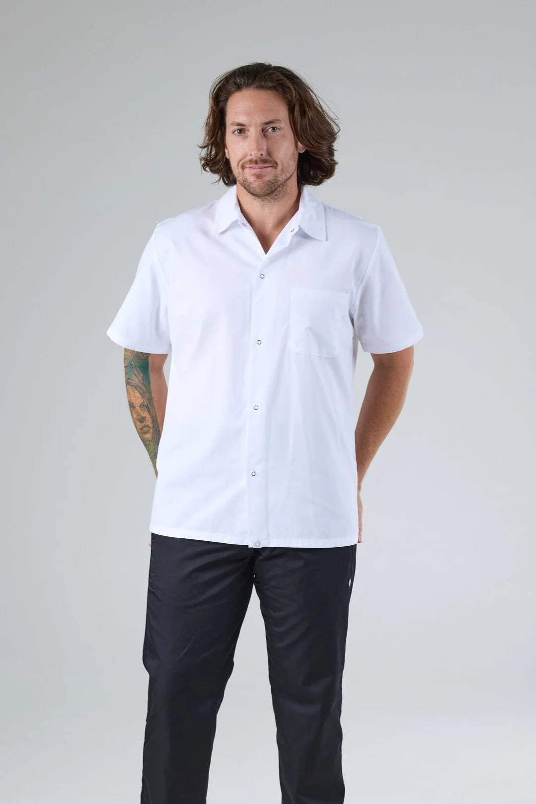 Chef Works men's utility cook shirt, lightweight and durable, with short sleeves and a collar, designed for professional kitchens.
