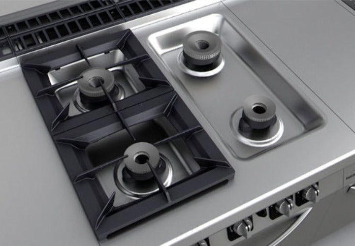 Fagor Kore 900 Series gas stove range with six burners and built-in oven, stainless steel kitchen appliance.